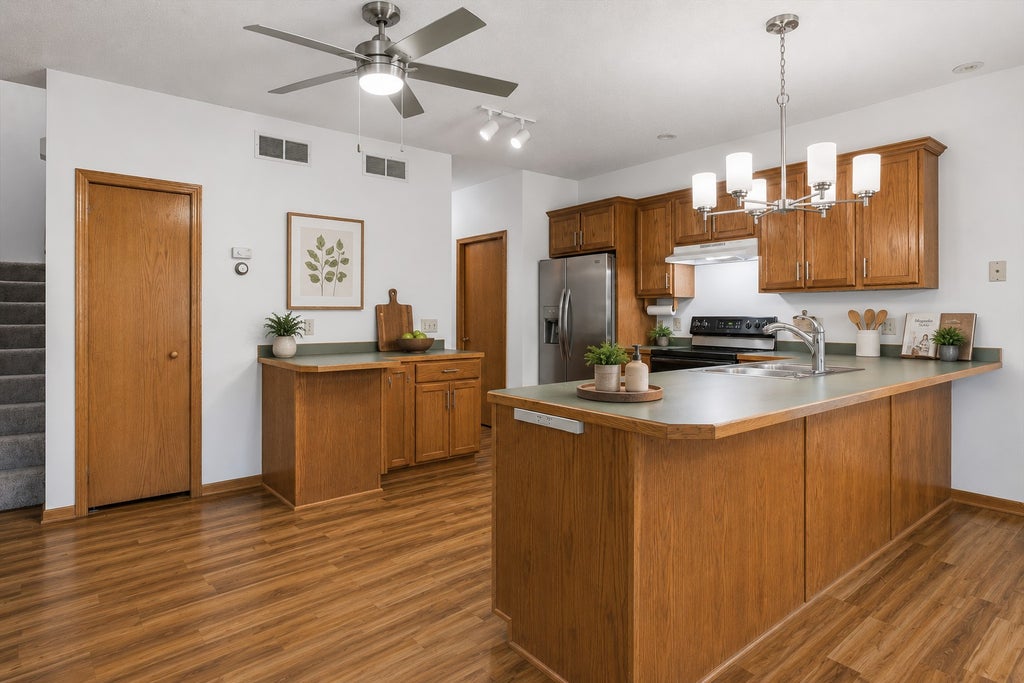 Photo of 7582 6th Street N, Oakdale, MN 55128 (MLS # 7093790)