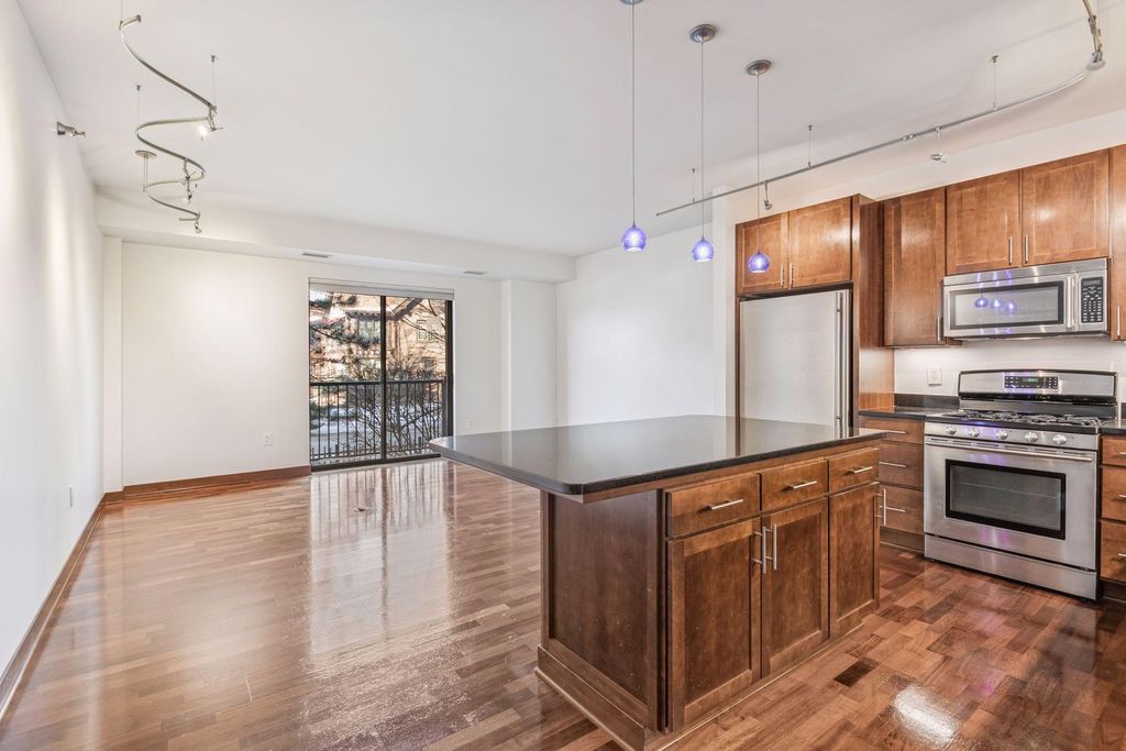 Photo of 317 Groveland Avenue #116, Minneapolis, MN 55403 (MLS # 7014837)