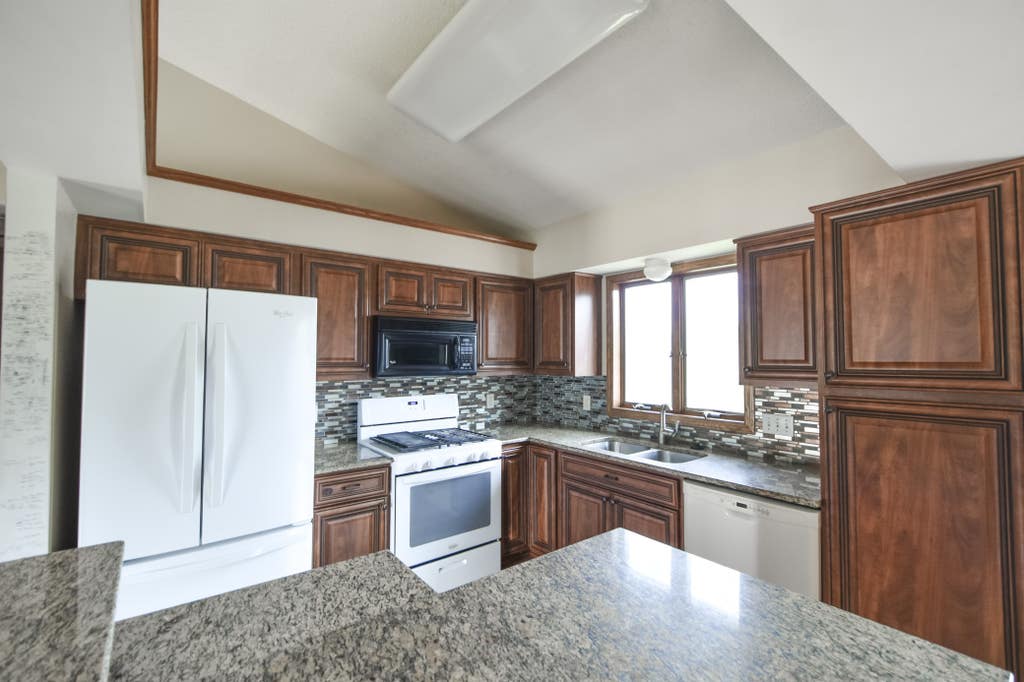 Photo of 1002 W 2nd Street, Zumbrota, MN 55992 (MLS # 7111258)