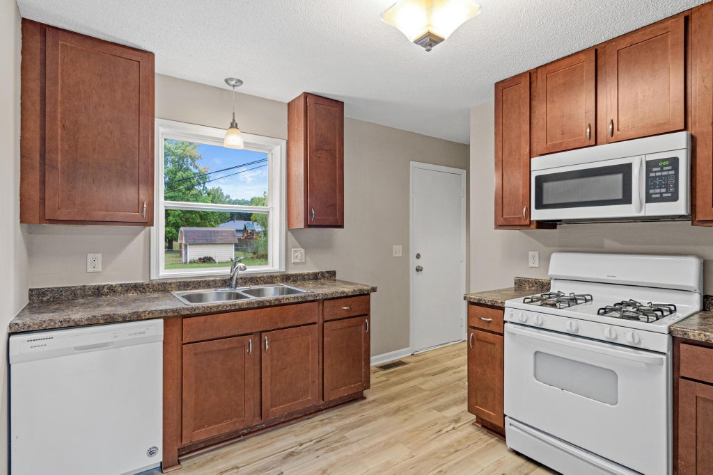 Photo of 1320 132nd Avenue NE, Blaine, MN 55434 (MLS # 7145386)