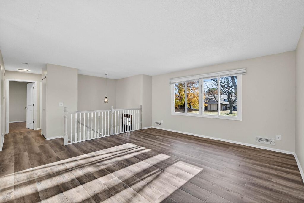 Photo of 7940 Lad Parkway, Brooklyn Park, MN 55443 (MLS # 7003685)