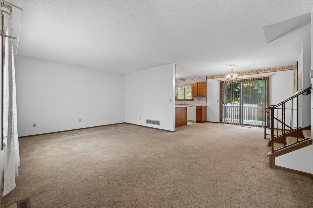 Photo of 212 126th Avenue NW, Coon Rapids, MN 55448 (MLS # 7106483)