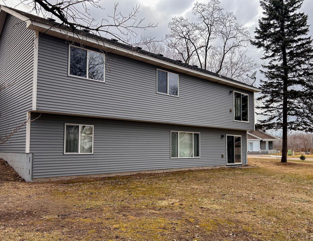 Photo of 21215 Old Lake George Boulevard NW, Anoka, MN 55011 (MLS # 7046179)