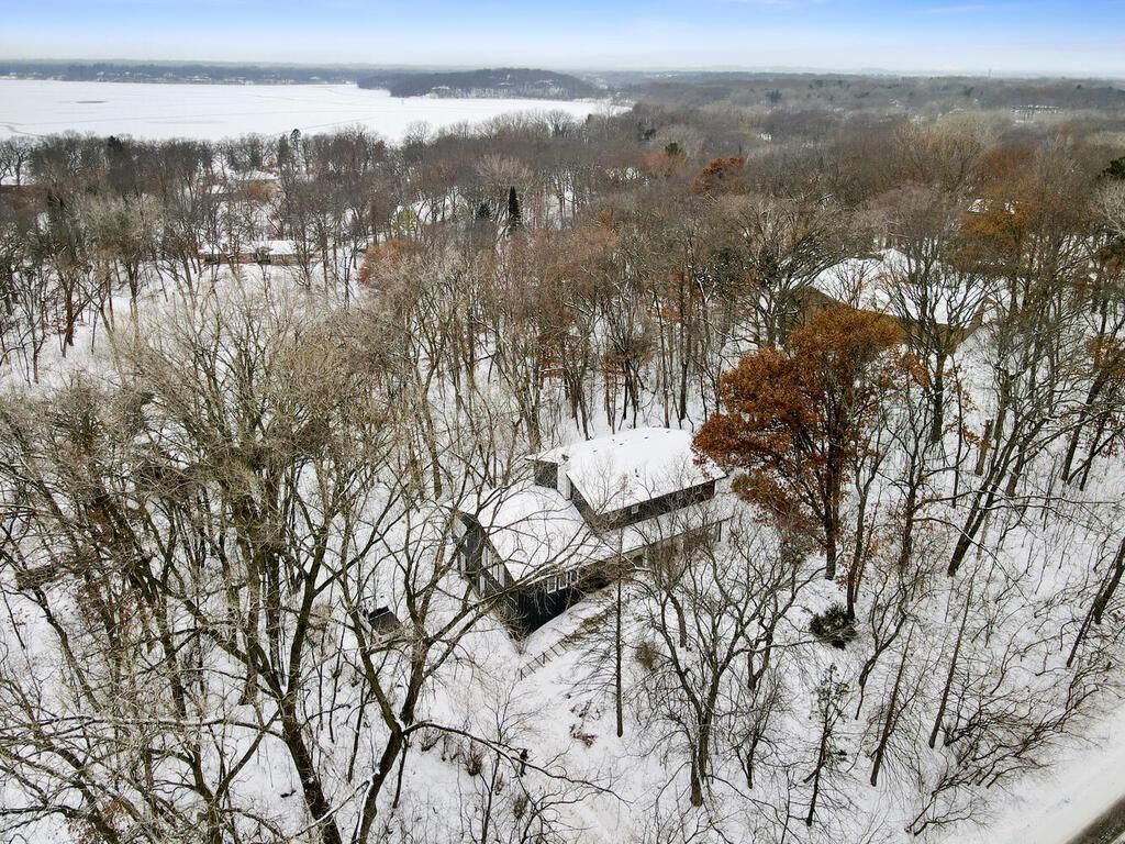 Photo of 75 E Pleasant Lake Road, North Oaks, MN 55127 (MLS # 6825526)