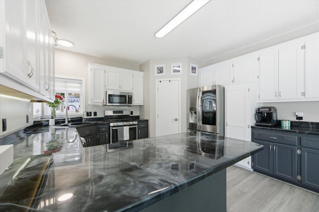 Photo of 13995 W Virginia Avenue, Savage, MN 55378 (MLS # 7012640)