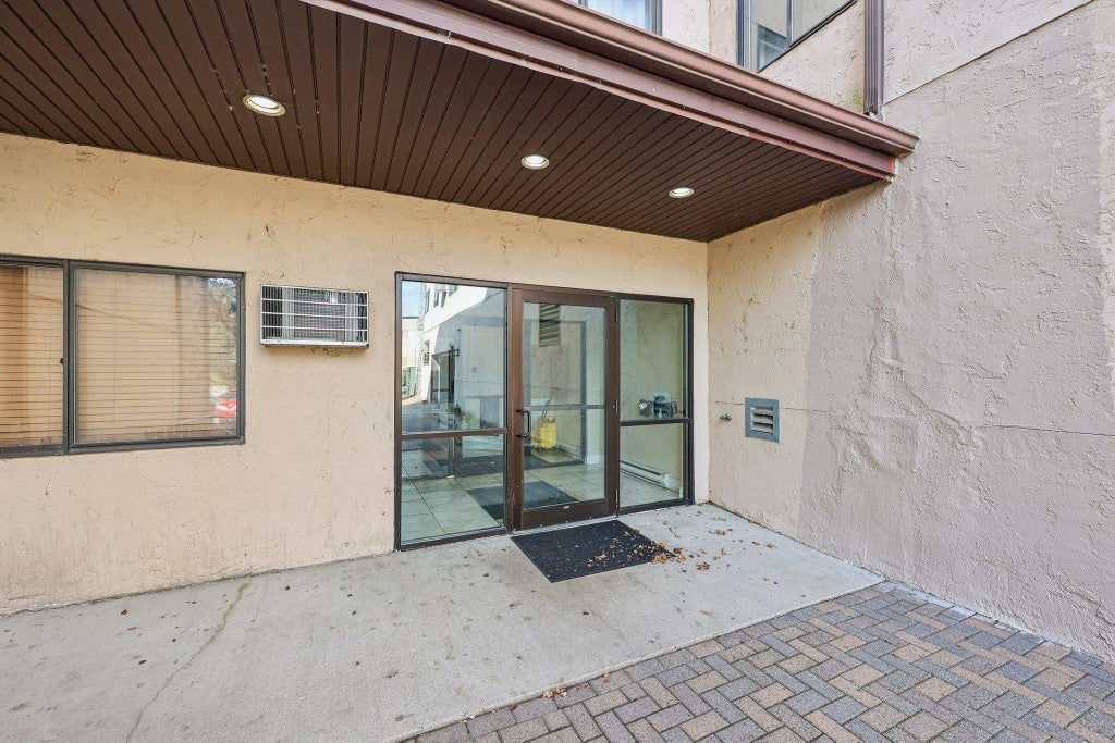 Photo of 221 Grand Ave AVE #115, South Saint Paul, MN 55075 (MLS # 7140106)