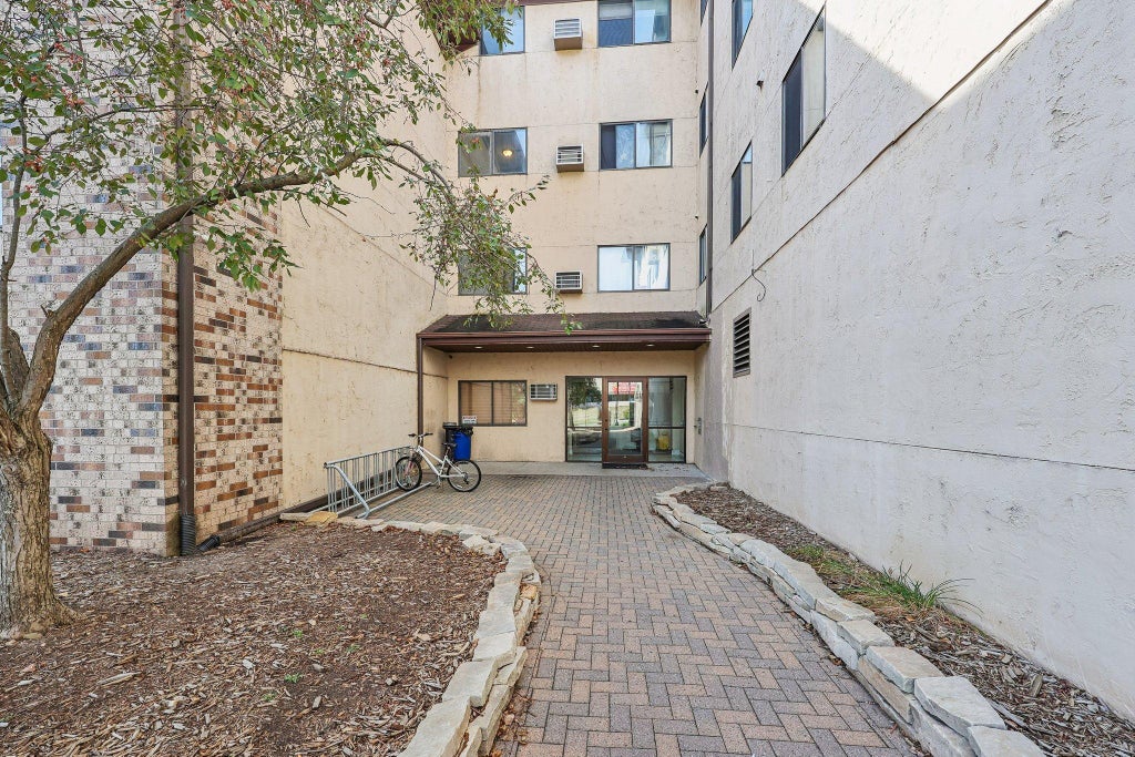 Photo of 221 Grand Ave AVE #115, South Saint Paul, MN 55075 (MLS # 7140106)
