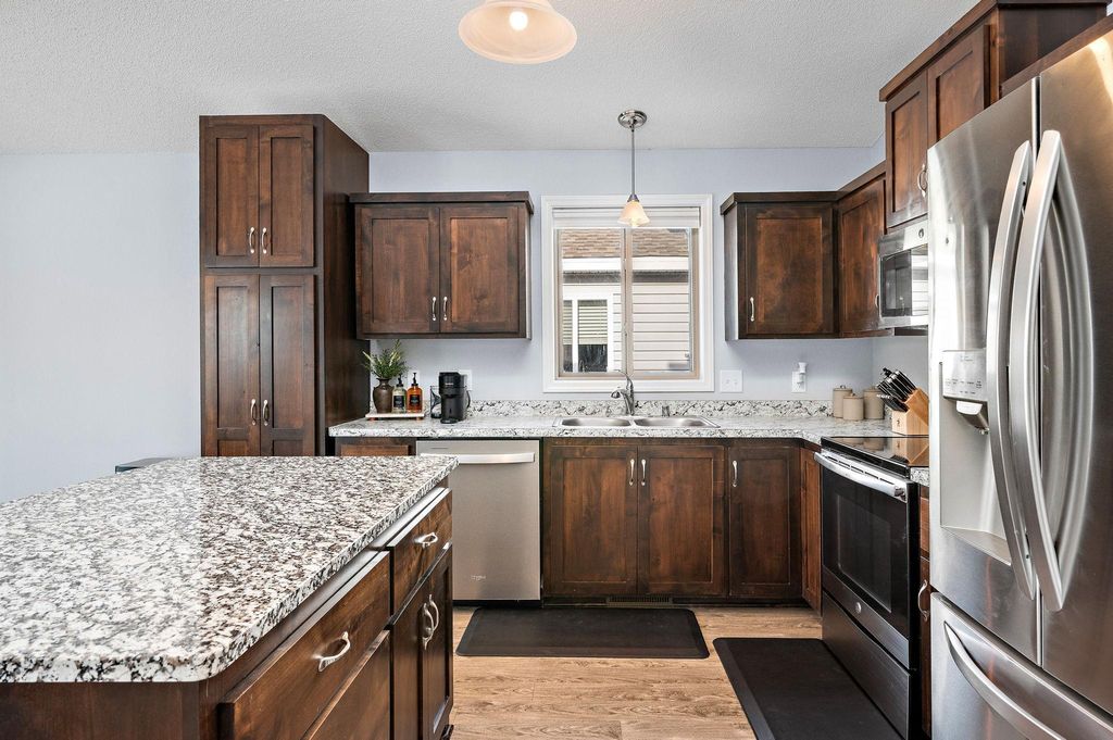 Photo of 12122 Hupp Street NE, Blaine, MN 55449 (MLS # 7011378)