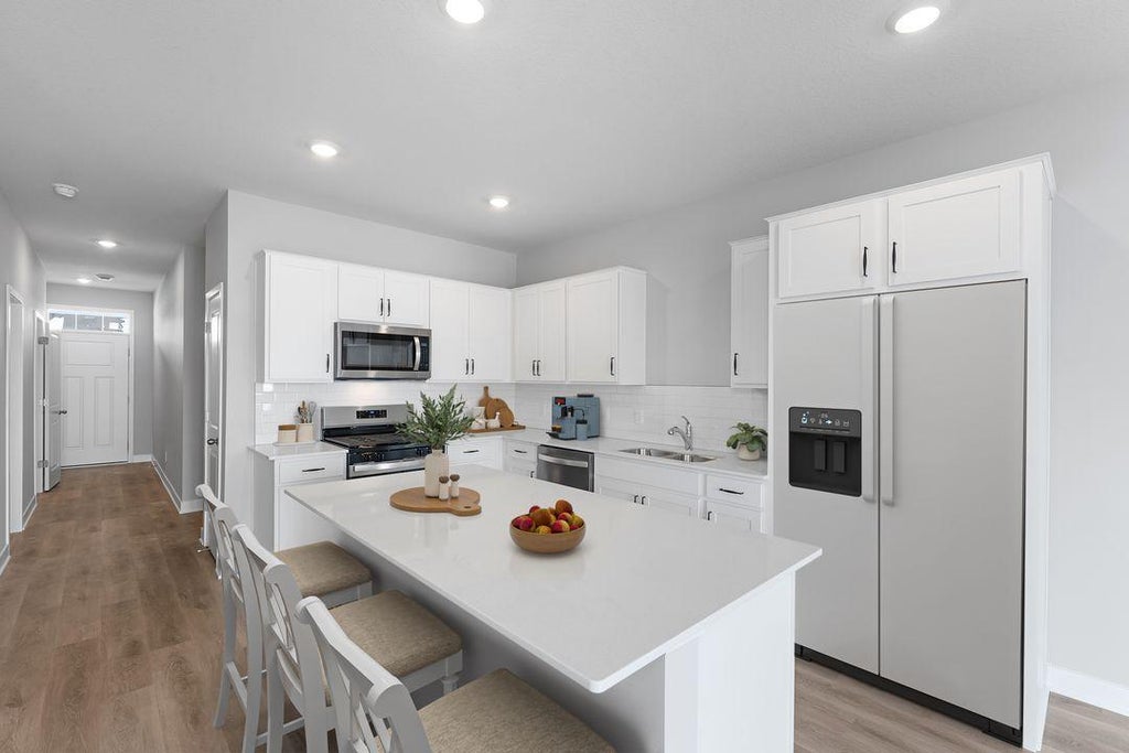 Photo of 925 Greenlawn Avenue W, Delano, MN 55328 (MLS # 7143464)