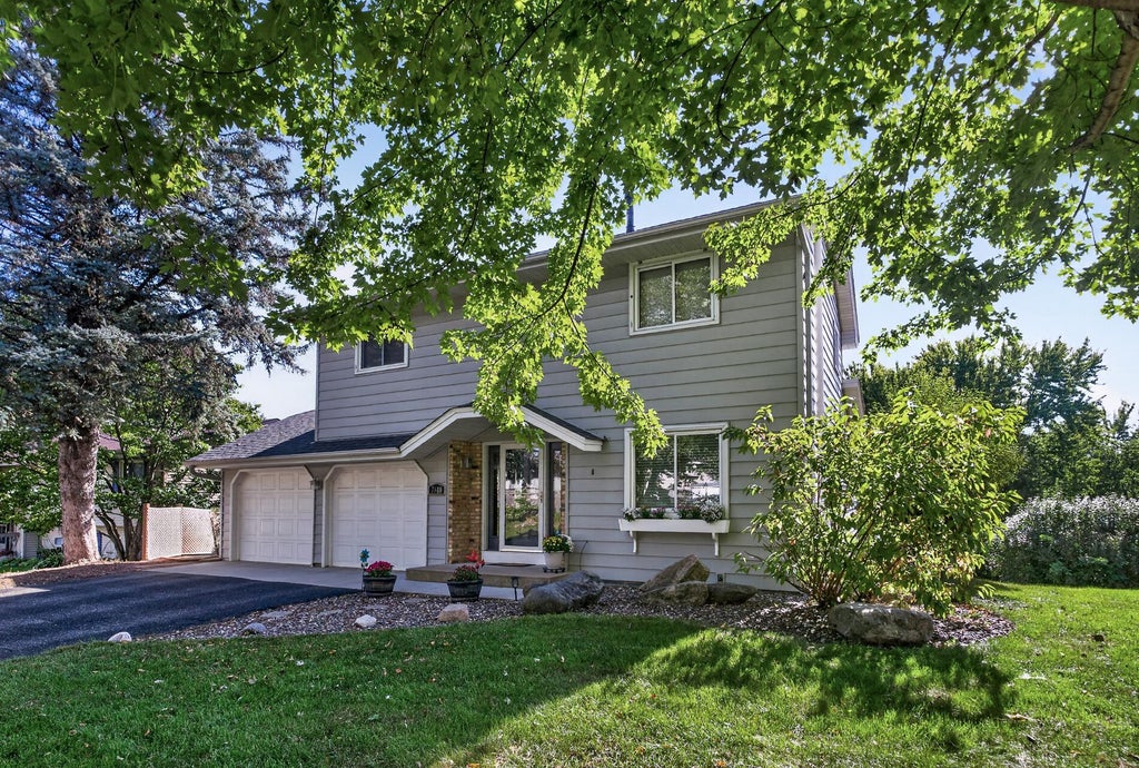 Photo of 7610 Lanewood Lane N, Maple Grove, MN 55311 (MLS # 7157583)