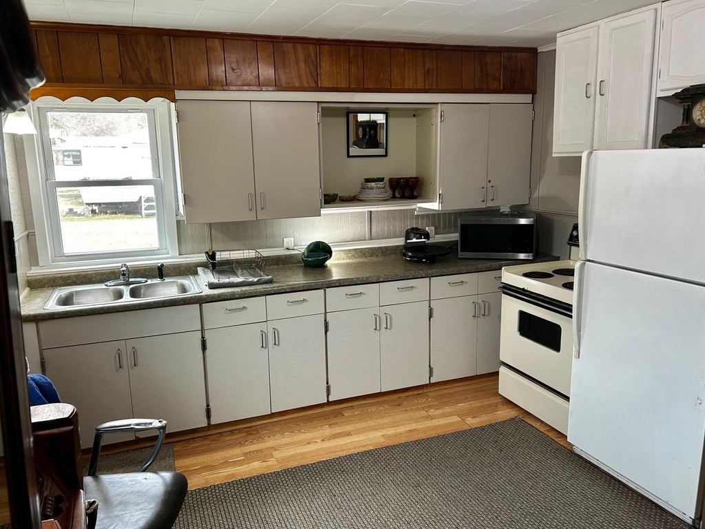 Photo of 726 E 2nd Street, Pillager, MN 56473 (MLS # 7103132)