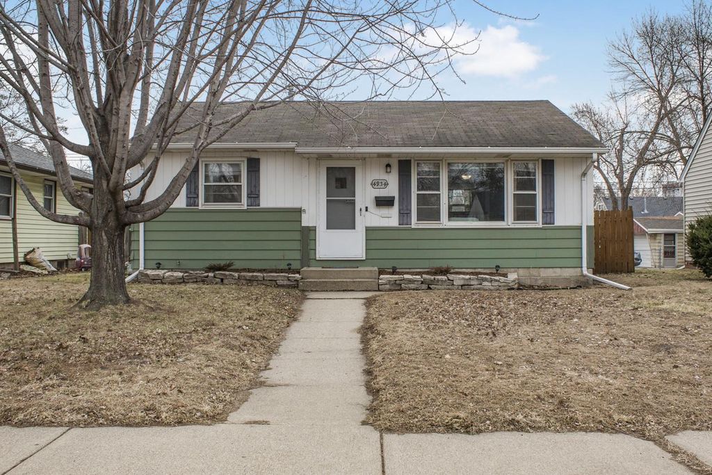 Photo of 4934 Sheridan Avenue N, Minneapolis, MN 55430 (MLS # 7026604)