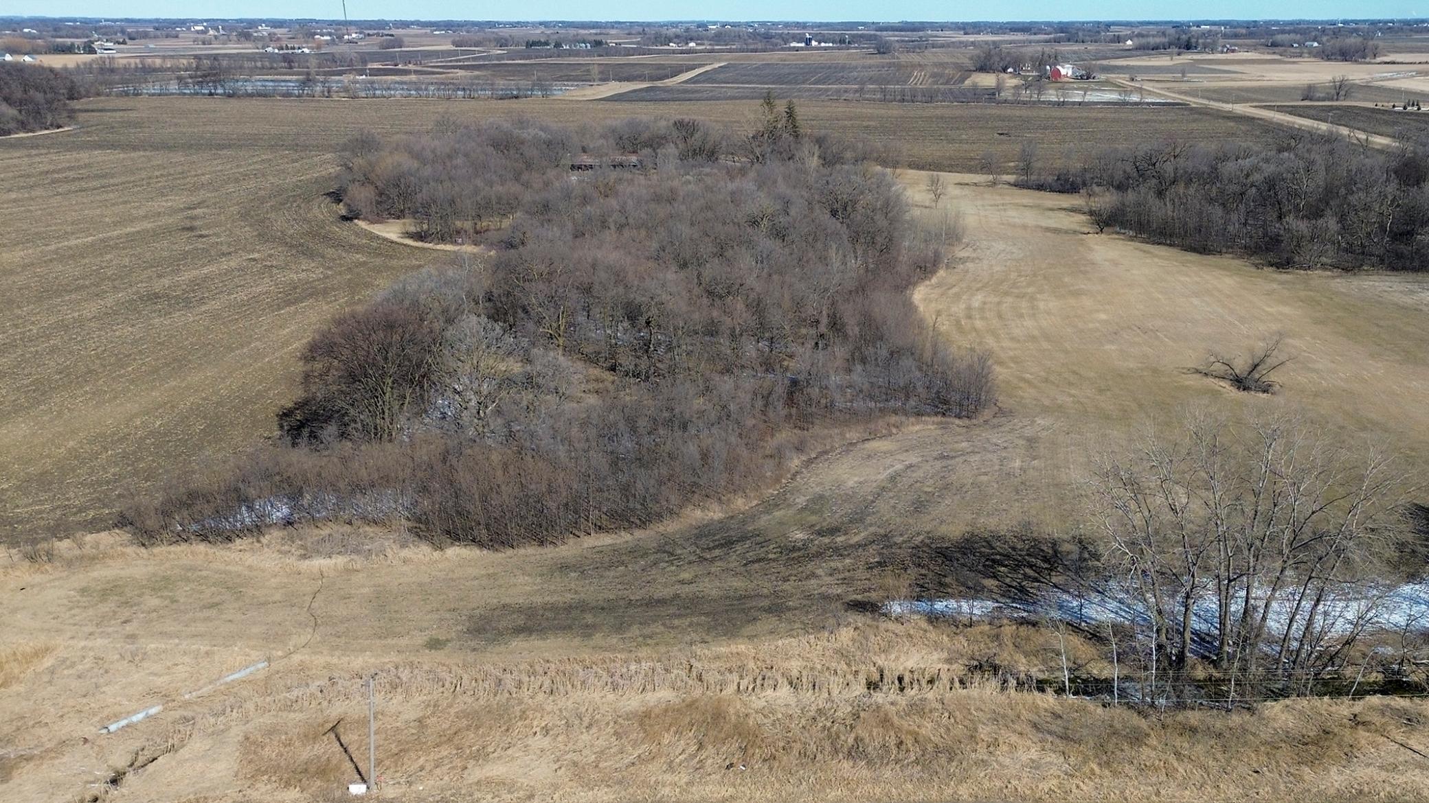 12.25 acres of buildable land approx 1-2 miles east of Silver Lake. Land is located off Hwy 7 and is 45 min west of the Twin Cities. Property has a mix of mature & light tree coverage.
