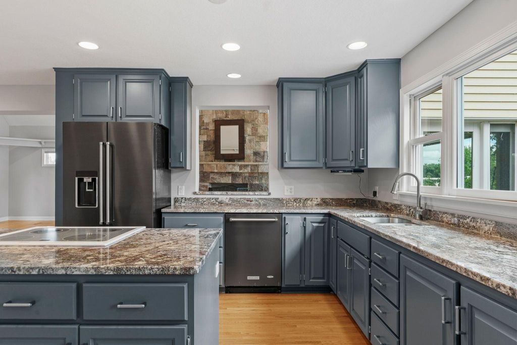 Photo of 223 E River Parkway, Champlin, MN 55316 (MLS # 7097760)