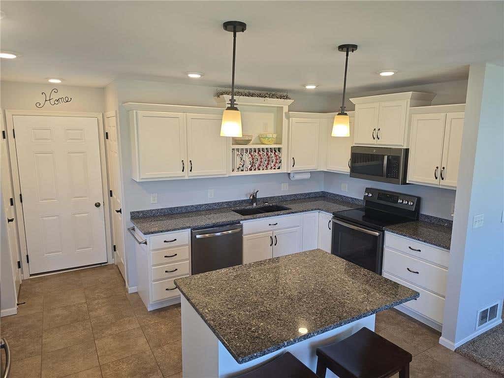 Photo of 698 Westland Lane, New London, MN 56273 (MLS # 7082097)