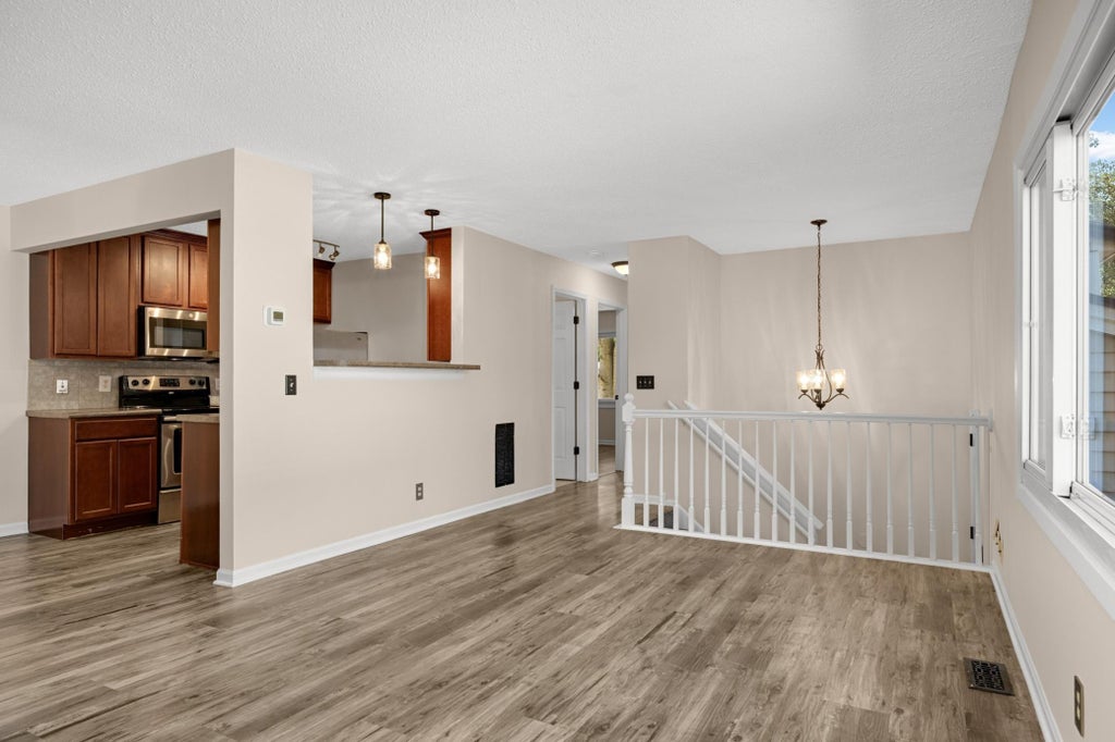 Photo of 1498 Woodview Avenue W, Eagan, MN 55122 (MLS # 7127687)