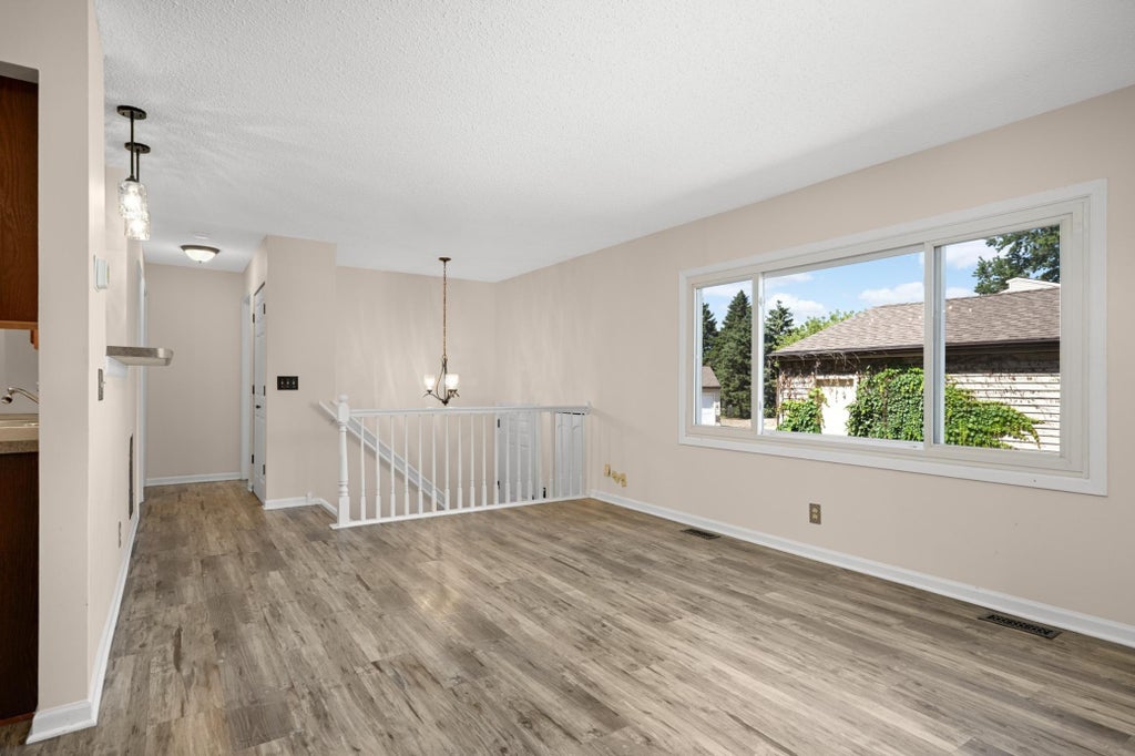 Photo of 1498 Woodview Avenue W, Eagan, MN 55122 (MLS # 7127687)