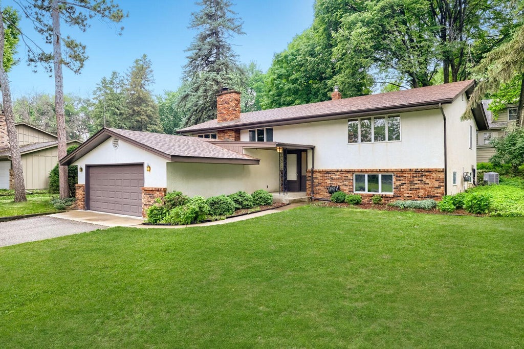 Photo of 6801 Willow Lane N, Brooklyn Center, MN 55430 (MLS # 7065417)