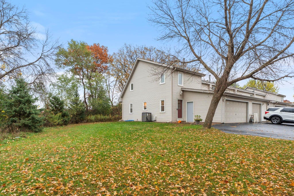 Photo of 12452 Redwood Street NW, Coon Rapids, MN 55448 (MLS # 7164448)