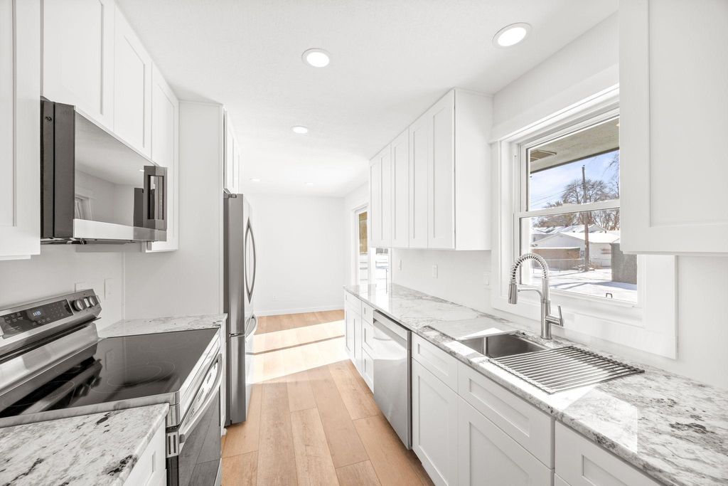 Photo of 10063 99th Place N, Maple Grove, MN 55369 (MLS # 6817844)