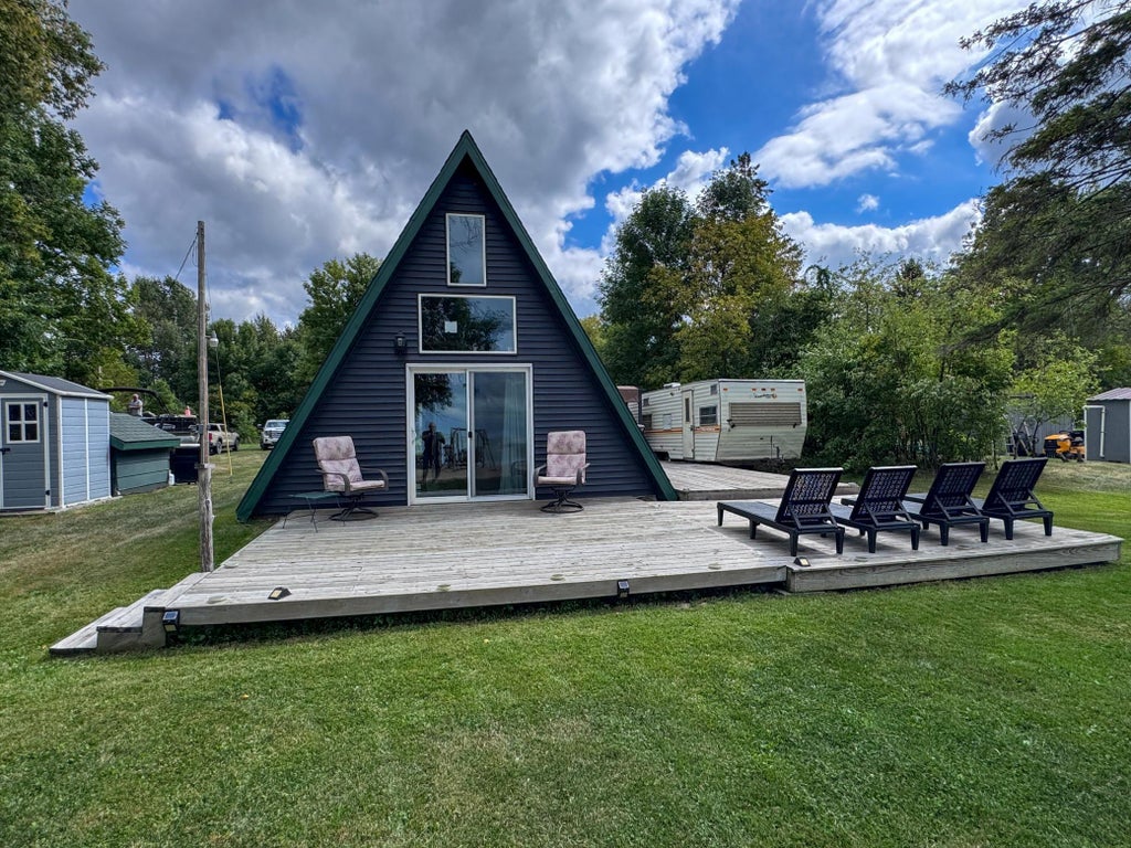 Photo of 21197 Joas Beach Road NE, Kelliher, MN 56650 (MLS # 7135817)