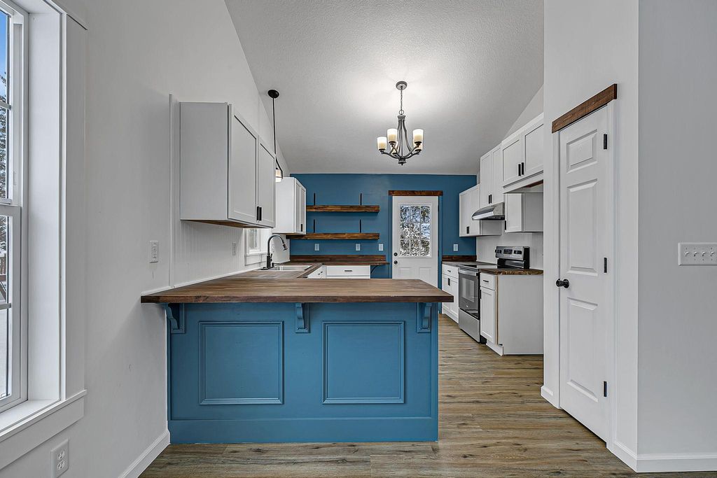 Photo of 1202 Blossom Boulevard NW, Isanti, MN 55040 (MLS # 7000515)