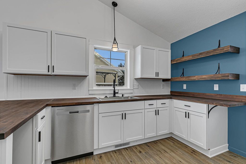 Photo of 1202 Blossom Boulevard NW, Isanti, MN 55040 (MLS # 7000515)