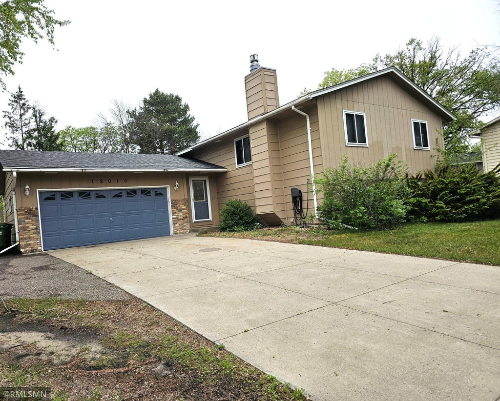 Photo of 12010 Ilex Street NW, Coon Rapids, MN 55448 (MLS # 7057302)