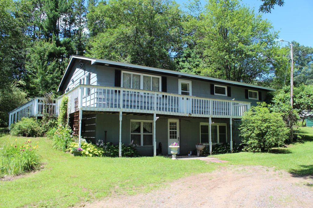 Photo of 2067 State Hwy 87, Saint Croix Falls, WI 54024 (MLS # 6757640)