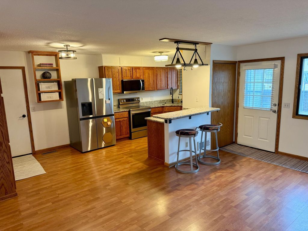Photo of 8541 S Pond Trail, Champlin, MN 55316 (MLS # 7031921)