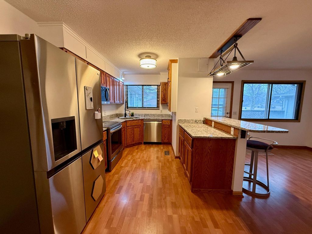 Photo of 8541 S Pond Trail, Champlin, MN 55316 (MLS # 7031921)