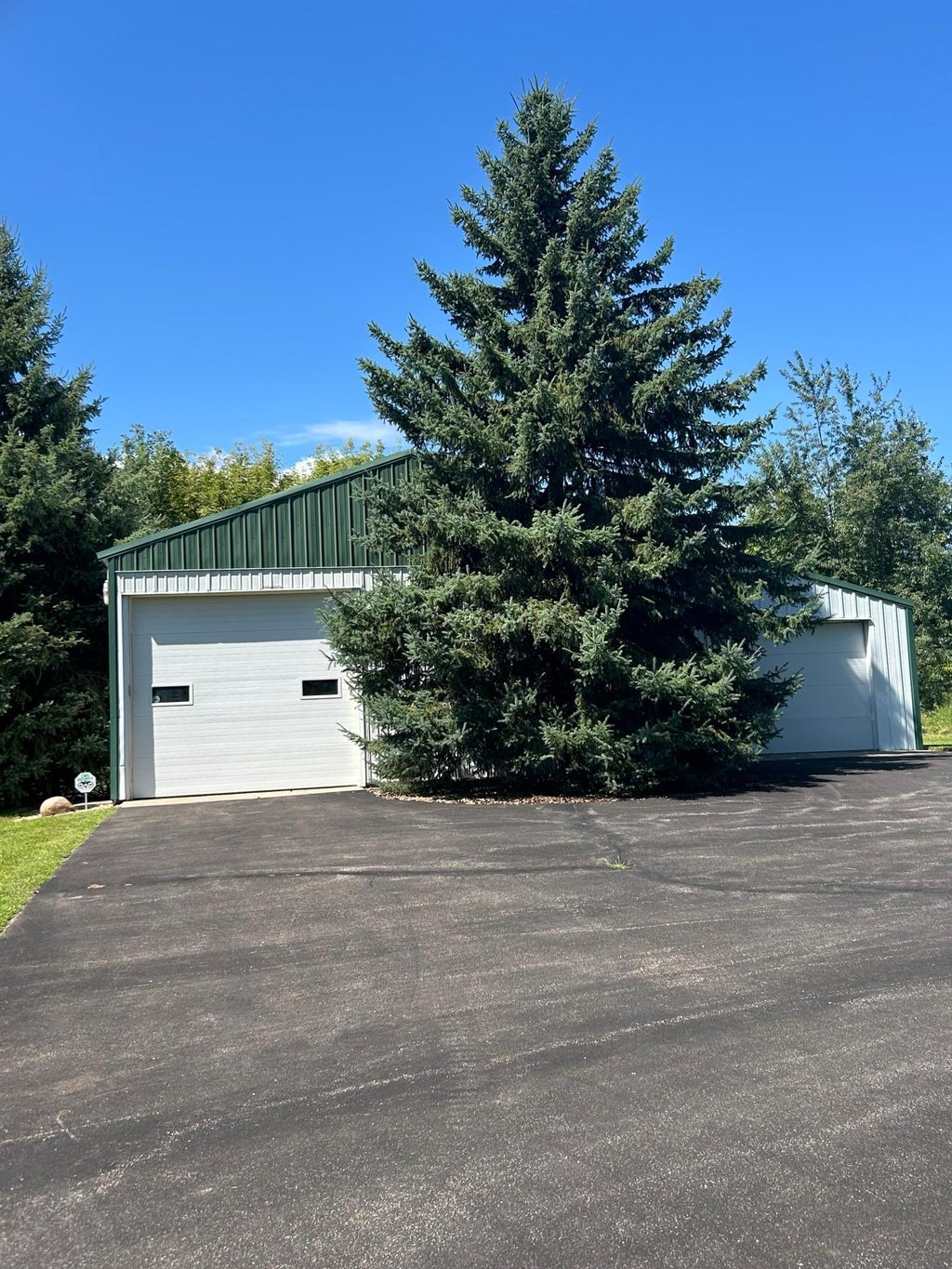 Photo of 7146 Military Road, Woodbury, MN 55129 (MLS # 7136579)