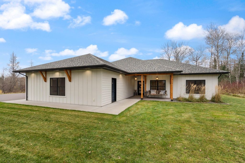 Photo of 59 E Riverside Road, Esko, MN 55733 (MLS # 7049655)