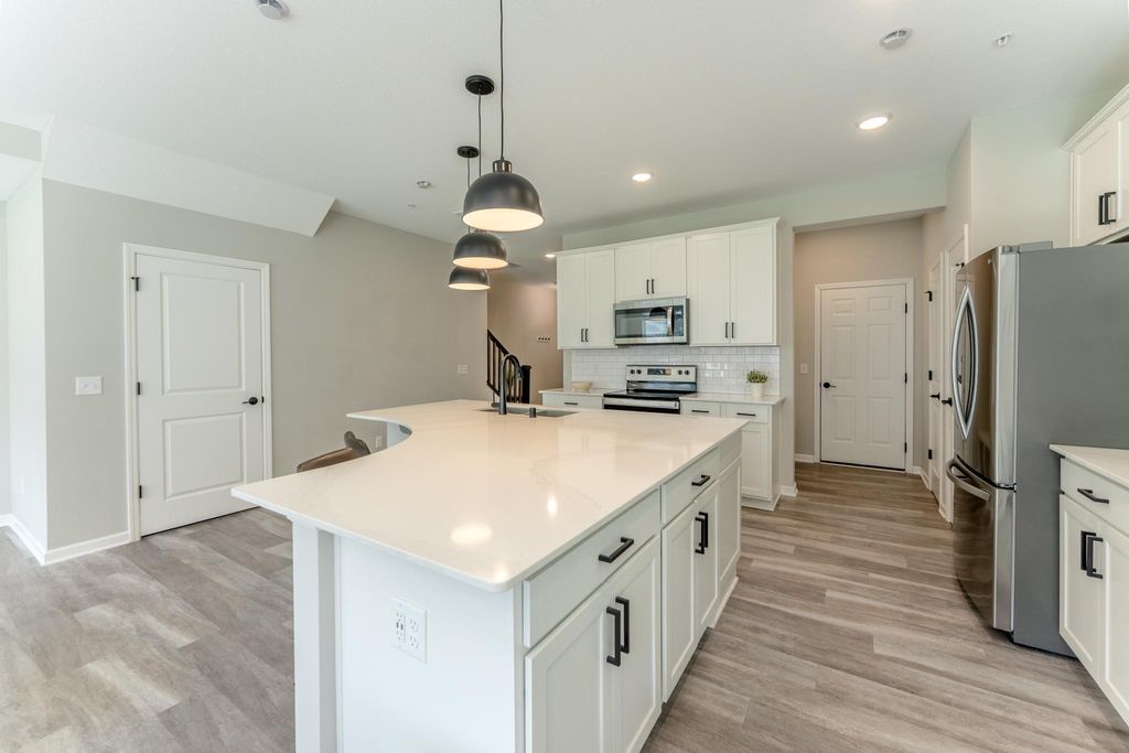 Photo of 4303 123rd Avenue NE #E, Blaine, MN 55449 (MLS # 7056949)