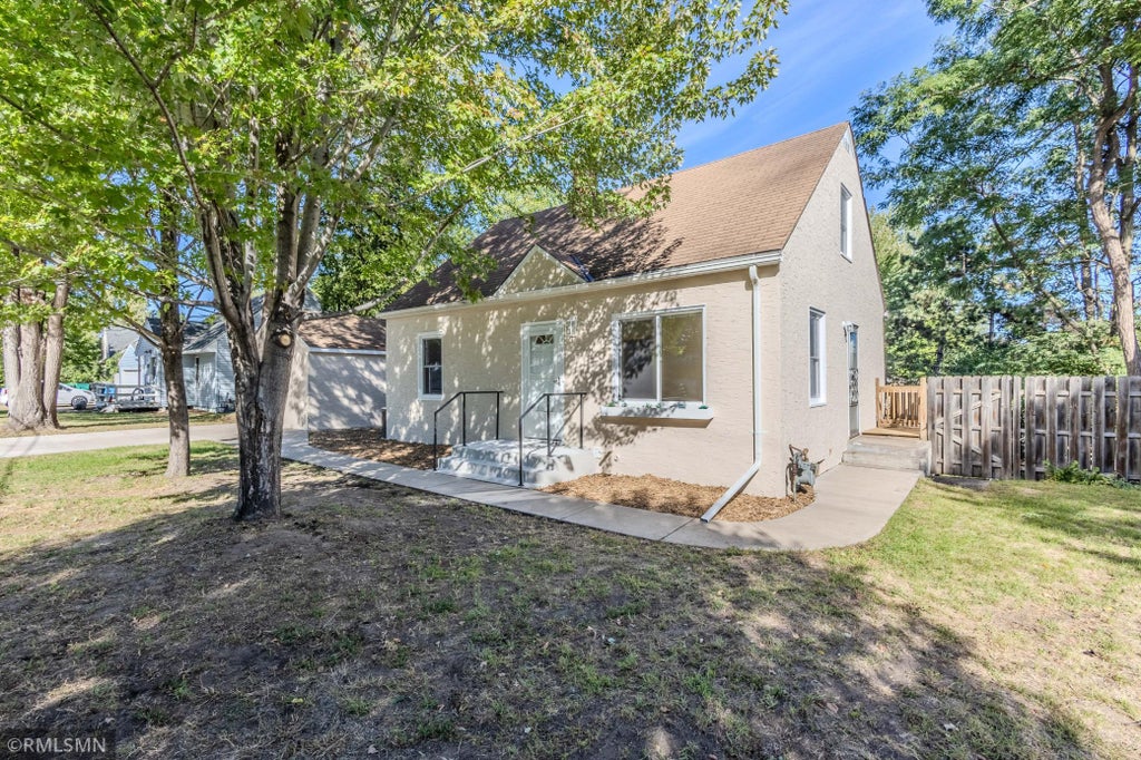 Photo of 6823 E River Road NE, Fridley, MN 55432 (MLS # 7146364)