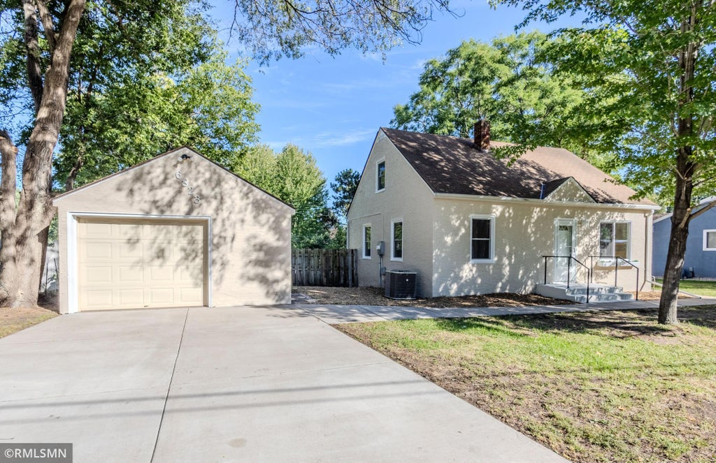 Photo of 6823 E River Road NE, Fridley, MN 55432 (MLS # 7146364)