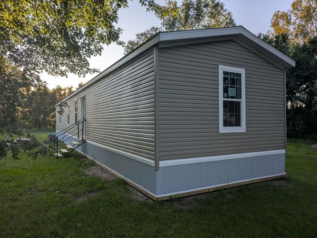 Photo of 100 Rose Park Park, Melrose, MN 56352 (MLS # 7080042)