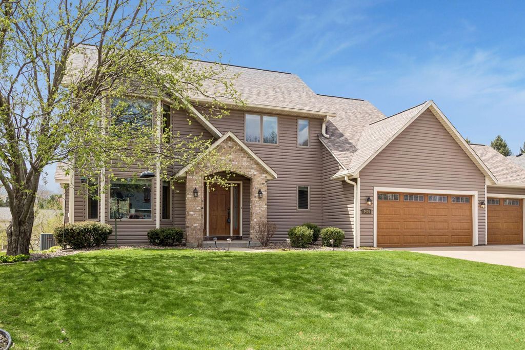 Photo of 2470 Queensport Road, Woodbury, MN 55125 (MLS # 7060637)