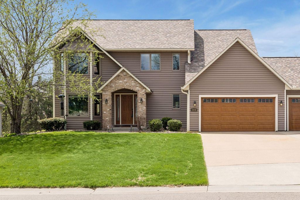 Photo of 2470 Queensport Road, Woodbury, MN 55125 (MLS # 7060637)