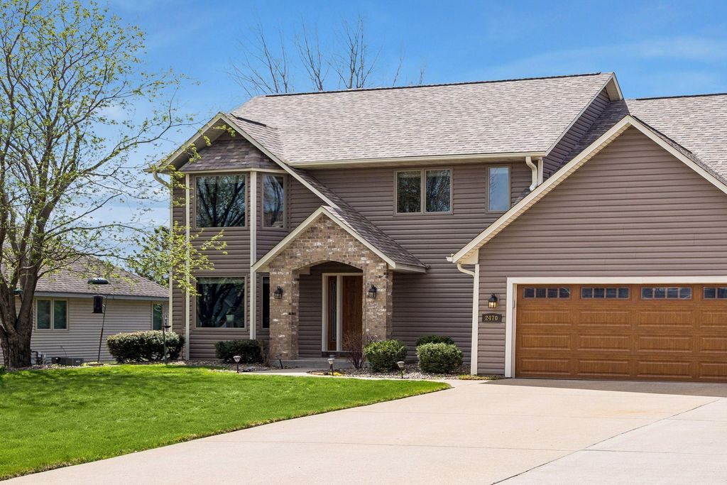 Photo of 2470 Queensport Road, Woodbury, MN 55125 (MLS # 7060637)