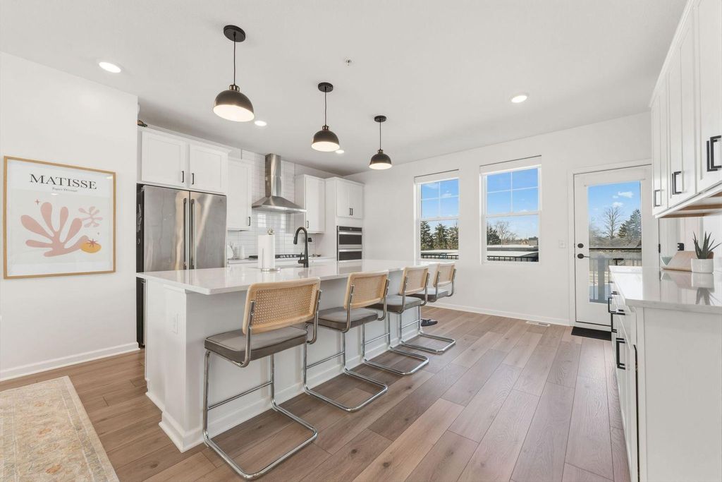 Photo of 879 Woodlawn Avenue #B, Saint Paul, MN 55116 (MLS # 7014620)