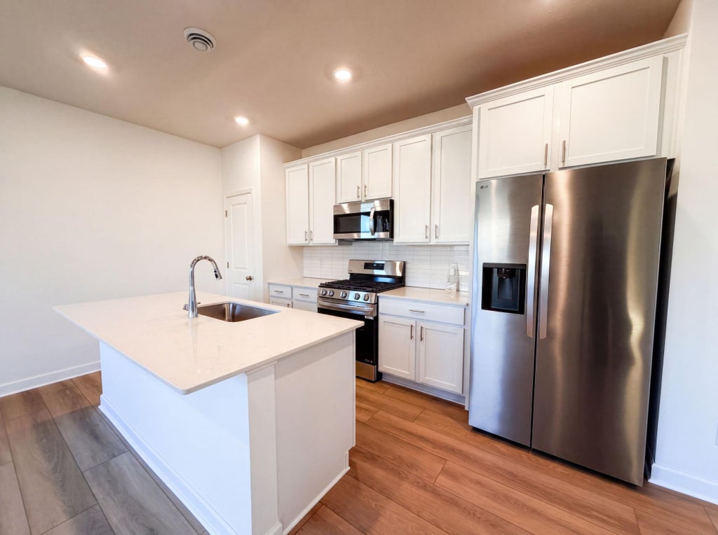 Photo of 10773 Hemingway Avenue S, Cottage Grove, MN 55016 (MLS # 7129301)