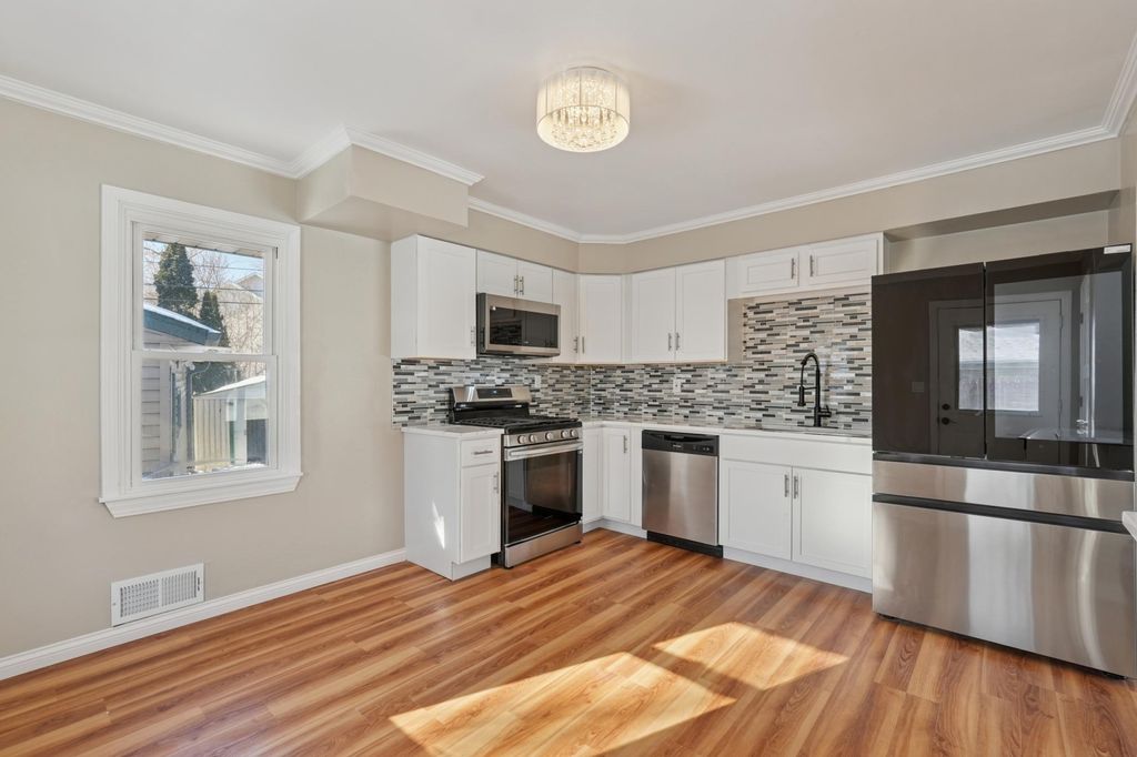 Photo of 761 Bartelmy Lane N, Maplewood, MN 55119 (MLS # 7013469)