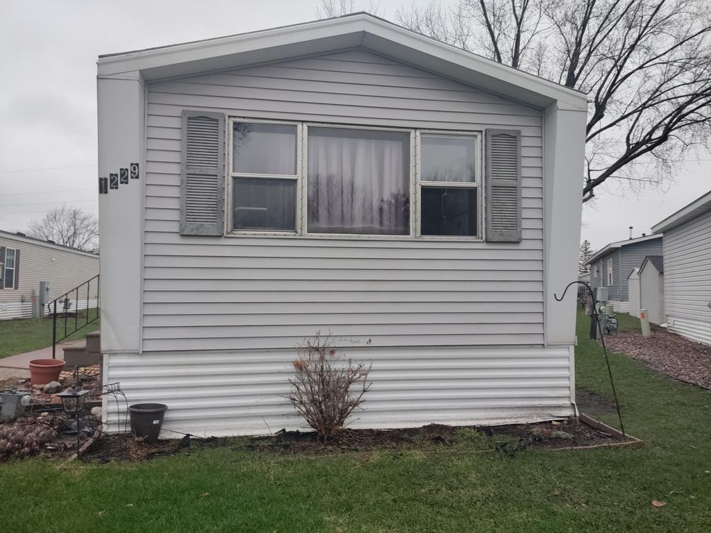 Photo of 1229 104th Avenue NE, Blaine, MN 55434 (MLS # 7005361)