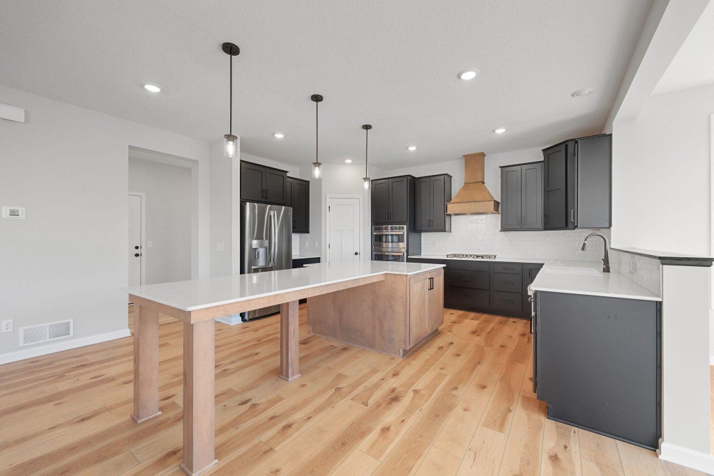 Photo of 1015 Legacy Drive, Delano, MN 55328 (MLS # 7147255)