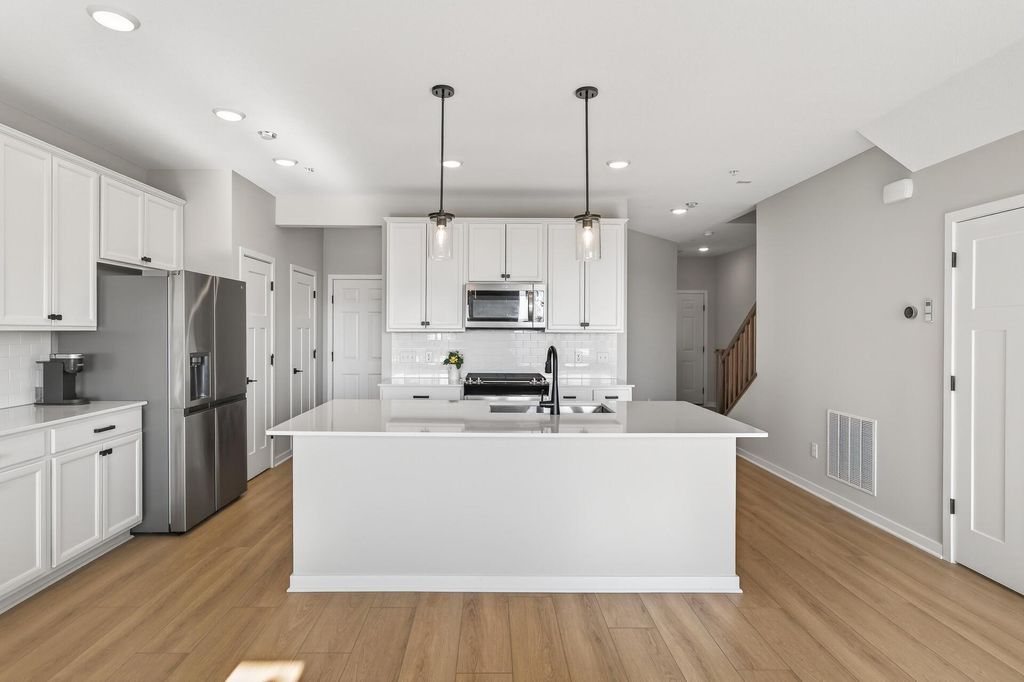 Photo of 10435 Ithaca Lane N, Maple Grove, MN 55369 (MLS # 7022907)