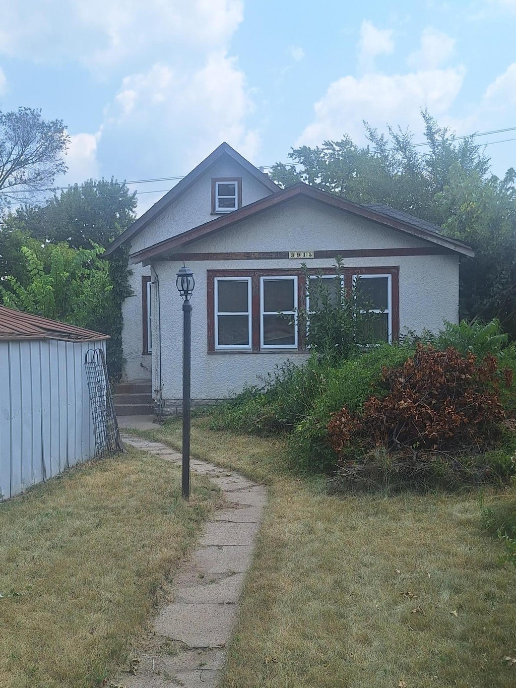 Photo of 3915 18th Ave AVE S, Minneapolis, MN 55407 (MLS # 7115616)