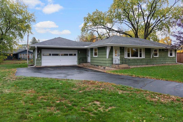 Photo of 2307 114th Lane NW, Coon Rapids, MN 55433 (MLS # 7165035)
