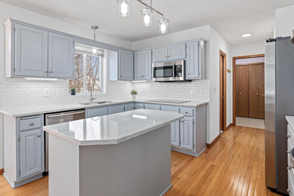 Photo of 8754 Maryland Avenue N, Brooklyn Park, MN 55445 (MLS # 7020832)