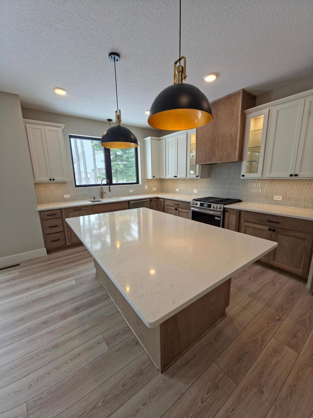 Photo of 3611 Edgerton Street, Vadnais Heights, MN 55127 (MLS # 6824671)